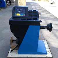 Machine d'équilibrage de roue de voiture approuvée CE avec 10 "-28" diamètre de jante 1g précision et 37.4 "diamètre de roue max à vendre