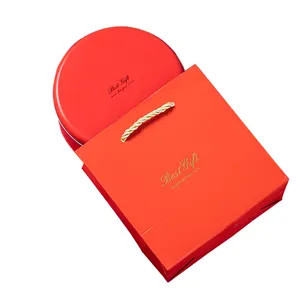时尚丝带蝴蝶结装饰奢华新年快乐红色纸质礼品袋和结婚礼盒