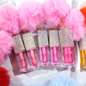 Aceite Labial Hidratante de Frutas de Larga Duración Marca Privada Bálsamo Transparente Brillo Labial con Logotipo Estampado en Caliente y Llavero - Product Image 1