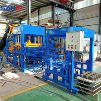 Ligne de production industrielle entièrement automatique Qt4-15B, machine à fabriquer des blocs de briques creuses en béton à pression hydraulique, à vendre