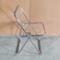Vente en gros de chaises de salle à manger pliantes modernes, portables, transparentes et transparentes pour l'hôtel, le bureau, la salle de réunion et le salon en plastique.