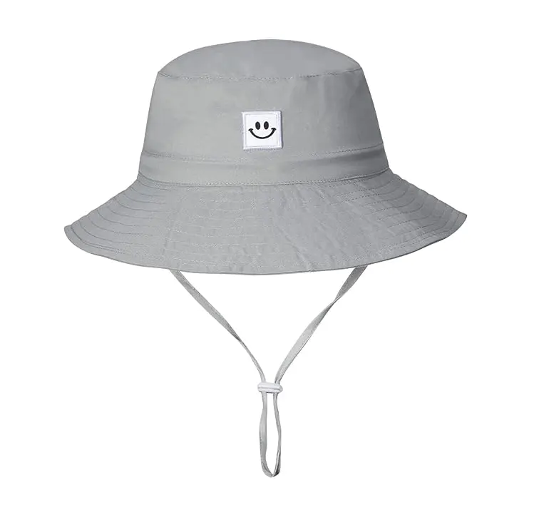 Topi bayi Sun wajah tersenyum UPF 50 + topi ember balita untuk anak laki-laki perempuan 0-7 tahun
