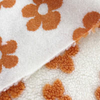 Tissu en jacquard de laine sherpa à fleurs de couleur personnalisée, design populaire 2026, pour vêtements