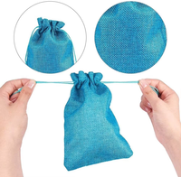 Vente en gros Sac cadeau pliable réutilisable avec corde à tirer Sac de jute avec logo personnalisé Différentes tailles et couleurs en chanvre nylon