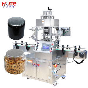 Machine de thermoscellage à rouleaux en acier inoxydable à 2 têtes, certifiée CE, pour bouteilles, bouchons, verres, canettes, produits chimiques - Product Image 1