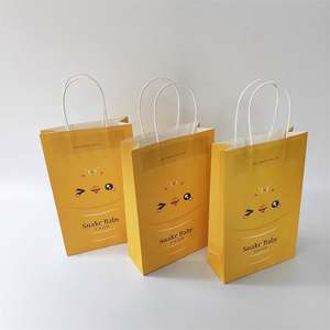 KM High Quality Yellow Smile Gift <b>Bags</b> <b>Paper</b> <b>Bag</b> with Tissue <b>Paper</b> for Birthday Baby Shower and Christmas Party - Product Image 1