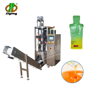 Xuguang Machine à sachets liquides irréguliers en pâte à grande vitesse Dentifrice à <span class=keywords><strong>eau</strong></span> Huile Crème cosmétique Échantillon Confiture Sachets de lait Machine d'emballage - Product Image 1