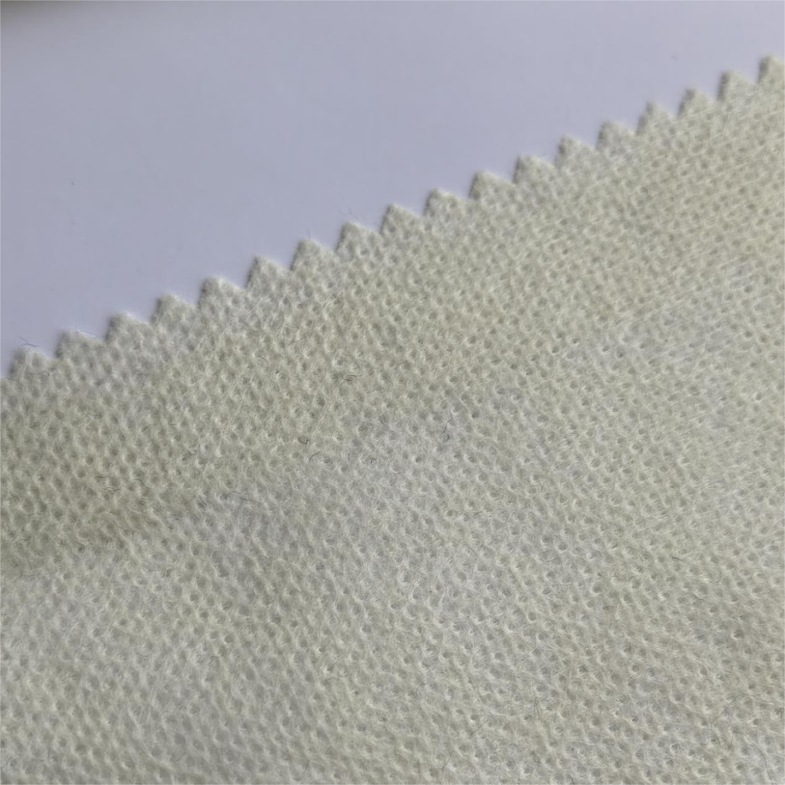 150cm Fabric Width 70g/m2 Flame-Retardant Spunlace Mesh Non-Woven Fabric for Sale