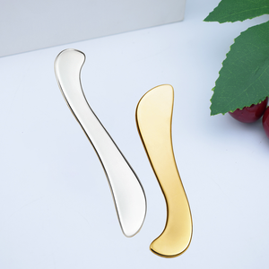 Herramienta de Masaje Facial Gua Sha de Acero Inoxidable en Oro Mate con Mango de Madera de Palisandro y Raspador Metálico - Product Image 4