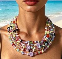 Collier bib multicouche en perles de verre fait main, avec perles œil et fleur de couleurs mélangées, style bohème