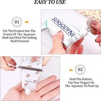Nouveau design de distributeur de dentifrice en acier inoxydable argenté en forme de clé distributeur de dentifrice en métal tube de crème pour le visage presse-dentifrice