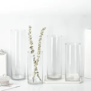 Barato al por mayor de varios tamaños claro elegante cilindro personalizado jarrón de vidrio para la decoración del hogar