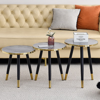 Table basse circulaire moderne combinée pour petits appartements, idéale pour les zones de réception haut de gamme et les salons simples