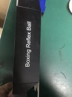 Balle de boxe réflexe avec bandeau en silicone réglable et logo personnalisé, dotée d'un anneau rotatif à 360 degrés