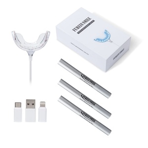 ชุดฟอกสีฟันมืออาชีพอเนกประสงค์ พร้อมไฟ LED คาร์บาไมด์เปอร์ออกไซด์ 35% ไม่ทำให้ฟันเสียว กลิ่นมินต์สดชื่น บรรจุในกล่องหรูหรา ได้รับมาตรฐาน CE - Product Image 1