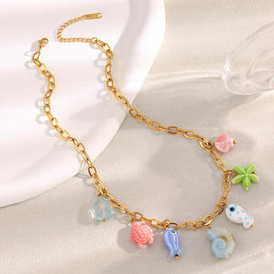 Collana Statement in Acciaio Inossidabile Placcato Oro 18K con Ciondolo a Forma di Pesce e Stella Marina Hawaiana in Ceramica Colorata, Inossidabile - Product Image 6