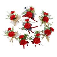 Boutonnière de mariage en œillet rouge avec verdure et ruban rouge, fleur artificielle faite à la main pour revers de costume de marié, bal de promo ou fête