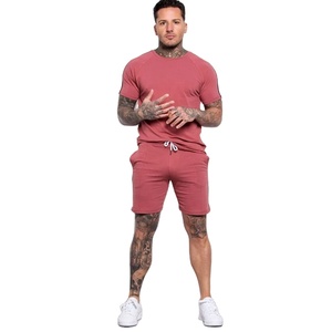 เสื้อยืดแขนสั้นผ้าฝ้ายลายทาง,ชุดผ้าฝ้ายสองส่วนสีตัดกันน้ำหนักเบาสำหรับฤดูร้อน - Product Image 1