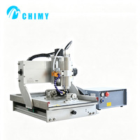 Machine de gravure CNC à quatre axes Chenmai Shandong 3040, 300x400mm, broche 2.2kW, précision 0.05mm, garantie 1 an