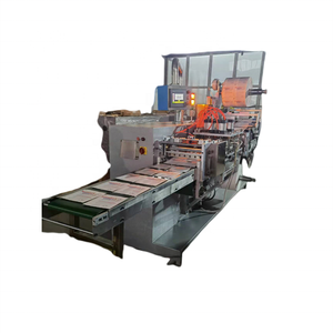 Macchina confezionatrice di guanti chirurgici in lattice completamente automatica macchina confezionatrice di tamponi di garza - Product Image 3