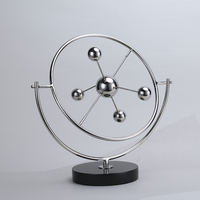 Sculpture Métallique Moderne Atom Orb, Décoration Artistique Abstraite Rotative, Écologique et Durable, Base en Marbre Noir, pour Maison, Bureau, Table