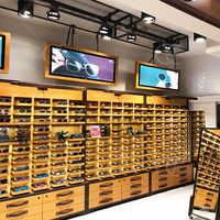Présentoir de magasin de lunettes, vitrine moderne en verre, présentoir professionnel en bois, vitrine de magasin de lunettes de mode