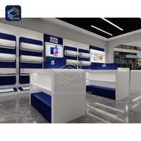 Étagère de recharge contemporaine, présentoir haut de gamme pour téléphones portables, vitrine en verre pour accessoires de téléphonie mobile