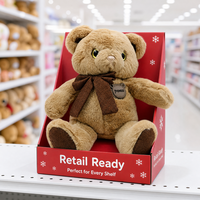 Adorable ours en peluche brun miel avec des yeux scintillants ambrés, un nœud en toile de jute et des pattes en tissu pour un cadeau confortable