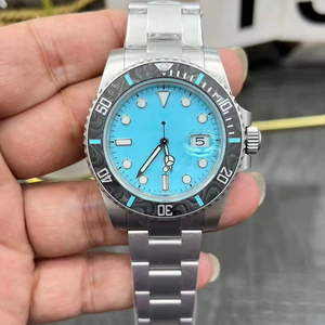 Reloj mecánico automático para hombre de 41 mm con esfera azul, función de fecha iluminada y bisel giratorio de cerámica, en acero inoxidable. - Product Image 1