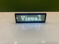 Insigne de nom LED programmable avec contrôle de l'application LED pour serveurs LED rechargeables LED de fête personnalisée PVC 25 décoration de centre commercial batterie au lithium polymère