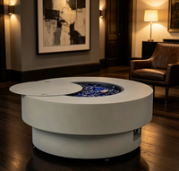 Grande table de foyer circulaire au gaz, construction métallique de qualité supérieure pour l'utilisation en extérieur dans les jardins et les cours.