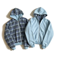 Sudadera con capucha reversible personalizada con cremallera completa, de forro polar de doble cara, con estampado a cuadros y liso, bolsillo canguro y puños acanalados, estilo casual urbano, al por mayor