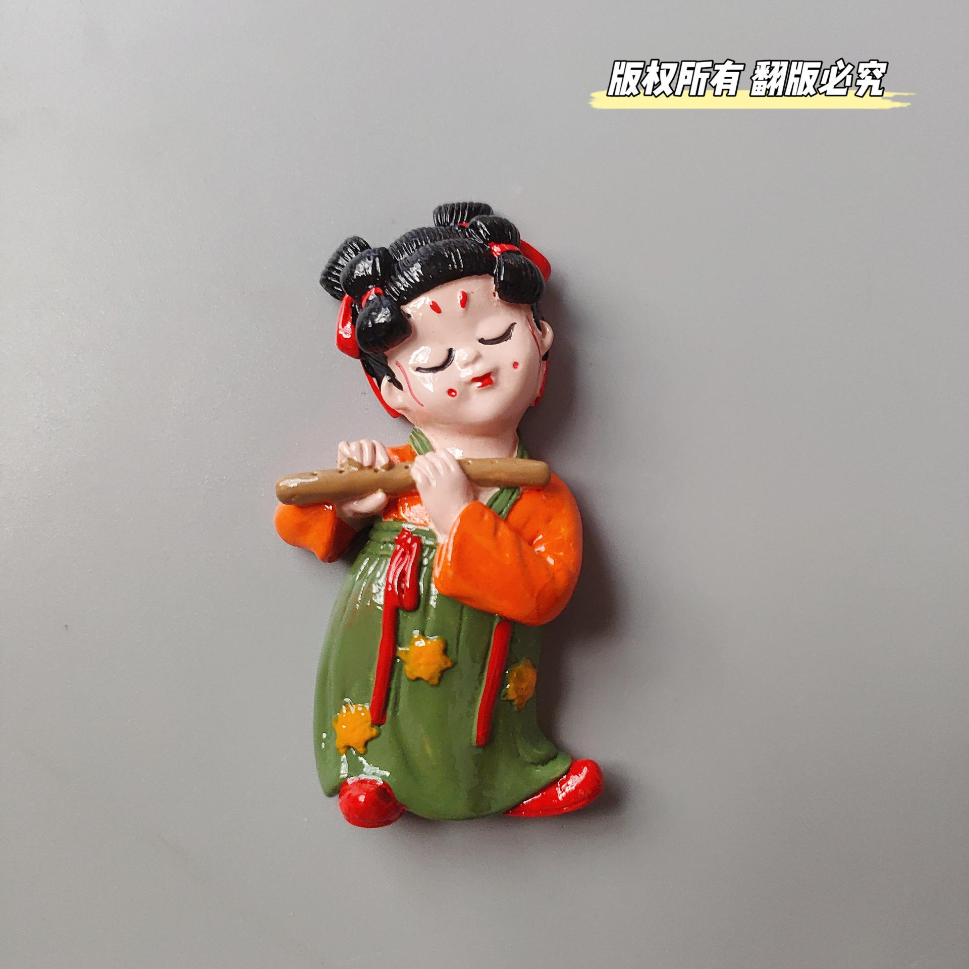 Little maid playing the flute