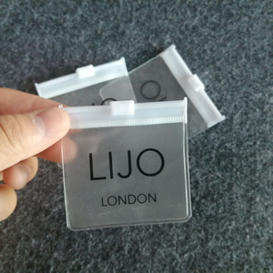 Biểu Tượng Tùy Chỉnh PVC Mini Dây Kéo Khóa Pouch Túi Đồ Trang Sức Nhỏ Bao Bì Zip Túi Nhựa Matte Dễ Thương Dây Kéo Túi Cho Bông Tai Tái Sử Dụng - Product Image 1