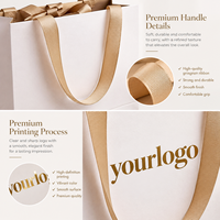 Sacs en papier carton ivoire personnalisés de luxe avec estampage à chaud doré et poignée en ruban pour boutiques de vêtements, bijoux et cadeaux