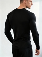 OEM/ODM T-shirt de sport décontracté uni à séchage rapide pour hommes, vêtements de musculation, compression élastique, manches longues, vêtements de sport pour l'entraînement