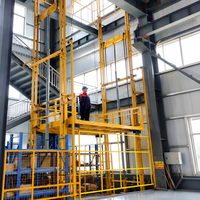 Elevatore da 1500 kg con guida singola per esterni, montacarichi da 10m/15m per magazzino, piattaforma di sollevamento merci