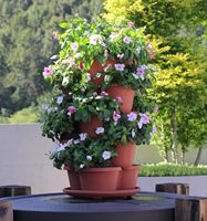 Jardinières en plastique anti-UV de tour empilable de ventes directes d'usine pour les plantes et les fleurs d'intérieur et extérieurs de jardin