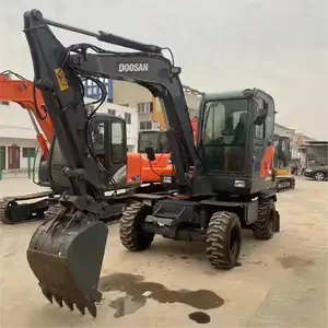 DOOSAN Usado Dx60W Mini Excavadora de ruedas 6 TON Excavadora de ruedas de segunda mano DX60 DH60 5t 6 t DOOSAN excavadora usada para la venta