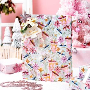 Papier d'emballage de Noël rose, design réversible à clochettes, 17 po x 32,8 pi, pour cadeaux, artisanat, fêtes, recyclable - Product Image 4