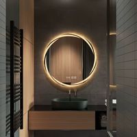 Miroir de salle de bain LED moderne tendance OEM ODM avec éclairage, capteur tactile intelligent, anti-buée et haut-parleur Bluetooth pour salon