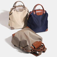 Tas Ransel Komputer Wanita Berkualitas Tinggi 2026, Anti Air, Bahan Nylon, Resleting, Tahan Lama, Kapasitas Besar, Cocok untuk Perjalanan Bisnis dan Komuter