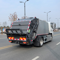 Camion compacteur de déchets électrique pur 4x2 Shacman EV Chassis 7m³ à chargement arrière pour la collecte des ordures et des déchets à vendre