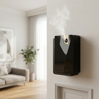 Mini diffuseur d'arômes sans eau à fixation murale, purificateur d'air parfumé 200 CBM, machine de diffusion de brume parfumée pour l'hygiène du bureau