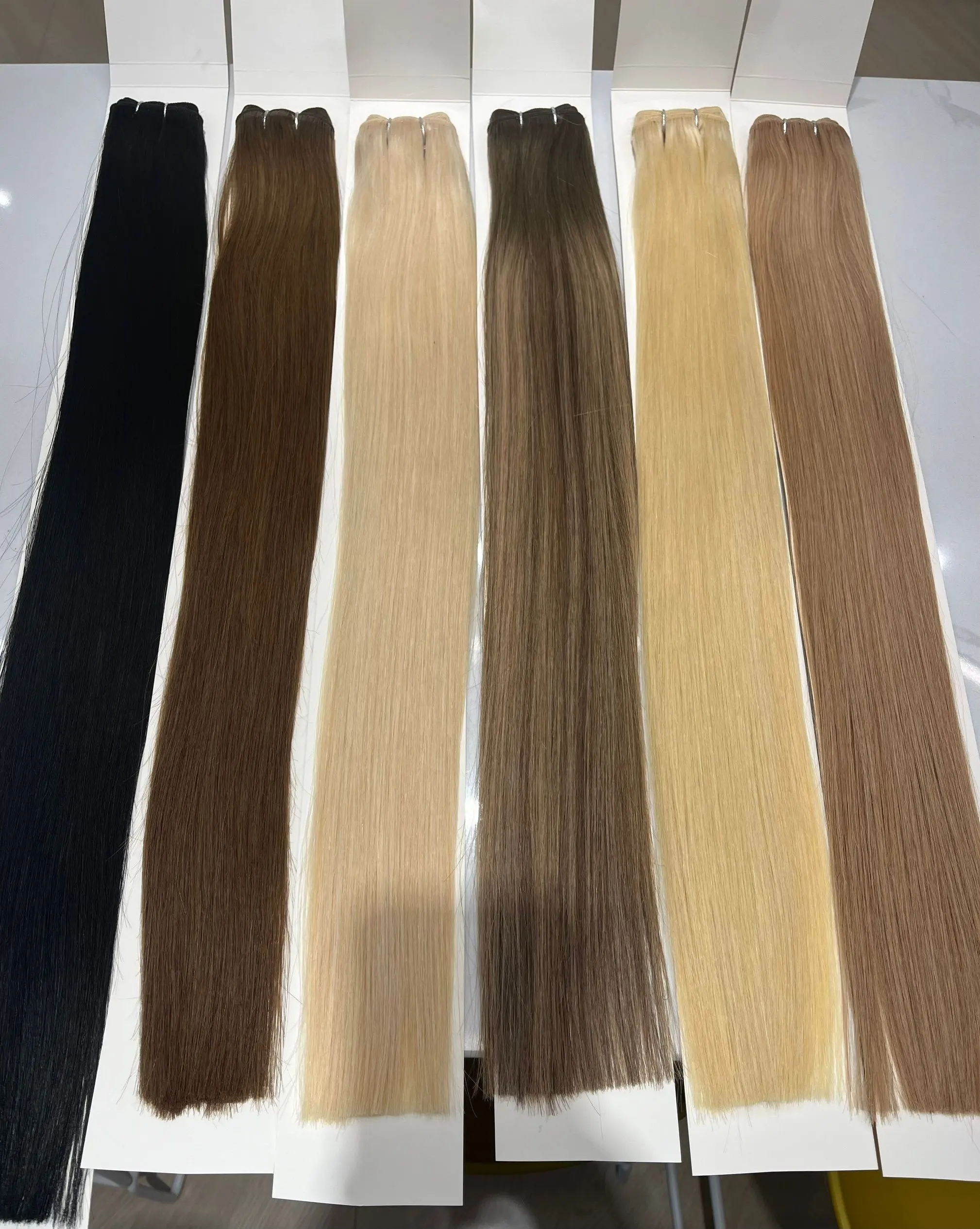 Double Drawn Blonde 613 colore capelli all'ingrosso visone cuticola allineato Remy Hair Machine Weave Bundles non trattati 100 capelli grezzi umani