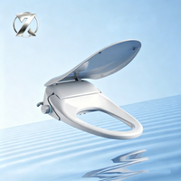 Nouveau couvercle de toilette intelligent chauffant en forme de V 2026 avec siège de bidet allongé, eau chaude instantanée, séchage à l'air et buse autonettoyante
