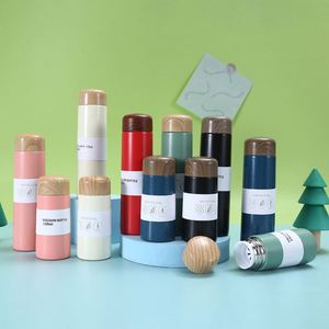 2025 Hot Selling Mini Insulated Wood Grain Lid Portable Drinking Sport Water <b>Bottle</b> for Children - Product Image 6