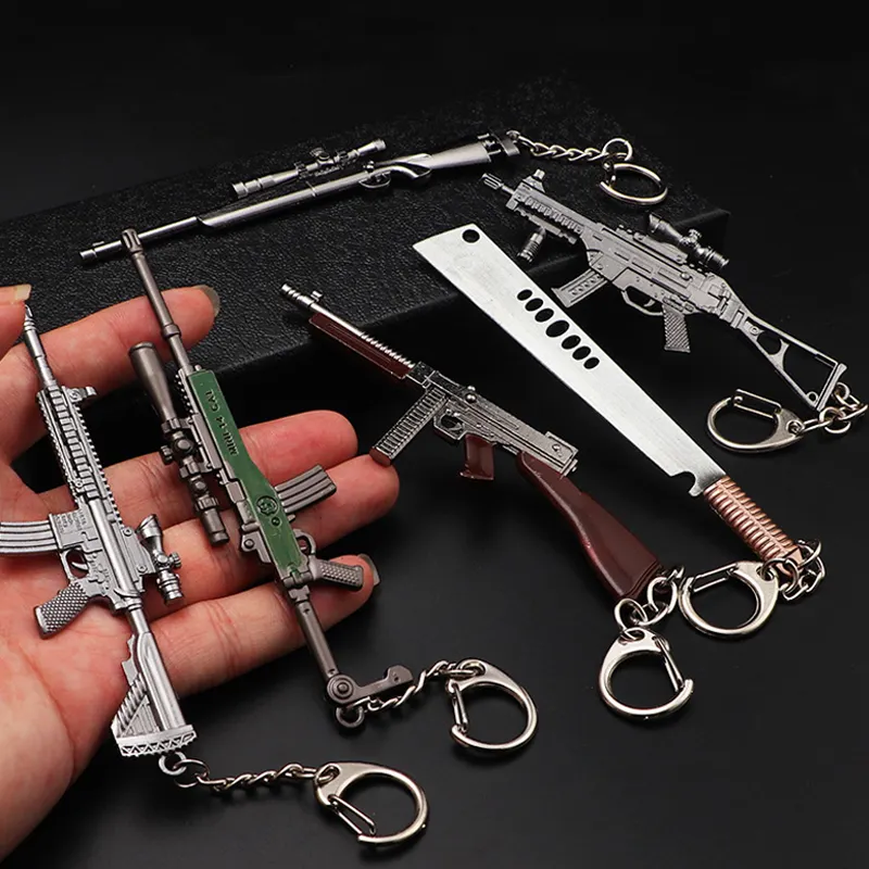 Hot mini metal rubber band hand guns valorant butterfly knife keychain accessories