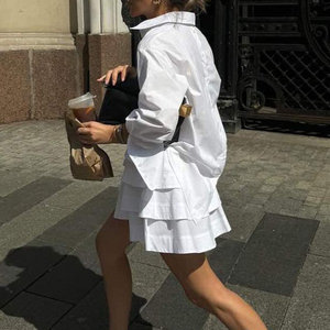 2025 moda blanco elegante <span class=keywords><strong>camisa</strong></span> de manga larga <span class=keywords><strong>con</strong></span> Bolsillos y minifalda <span class=keywords><strong>plisada</strong></span> de cintura alta conjunto de dos piezas de algodón suelto para mujer - Product Image 4
