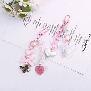 Llavero de moda para mujer con colgante creativo para teléfono móvil y cadena decorativa, estilo INS, novedoso y atractivo. - Product Image 6